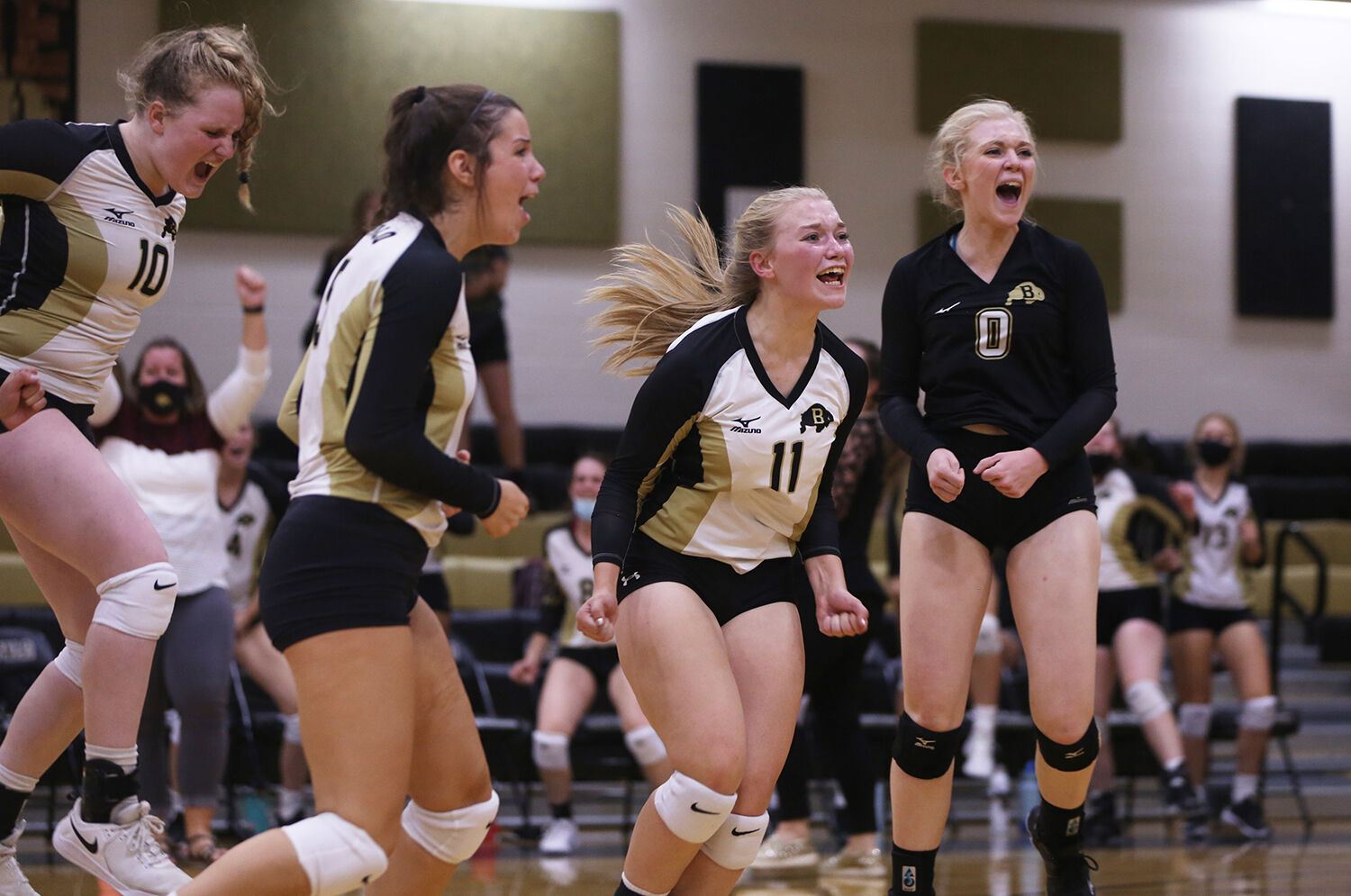 The Buffalo High School Lady Bison scream in excitement after winning